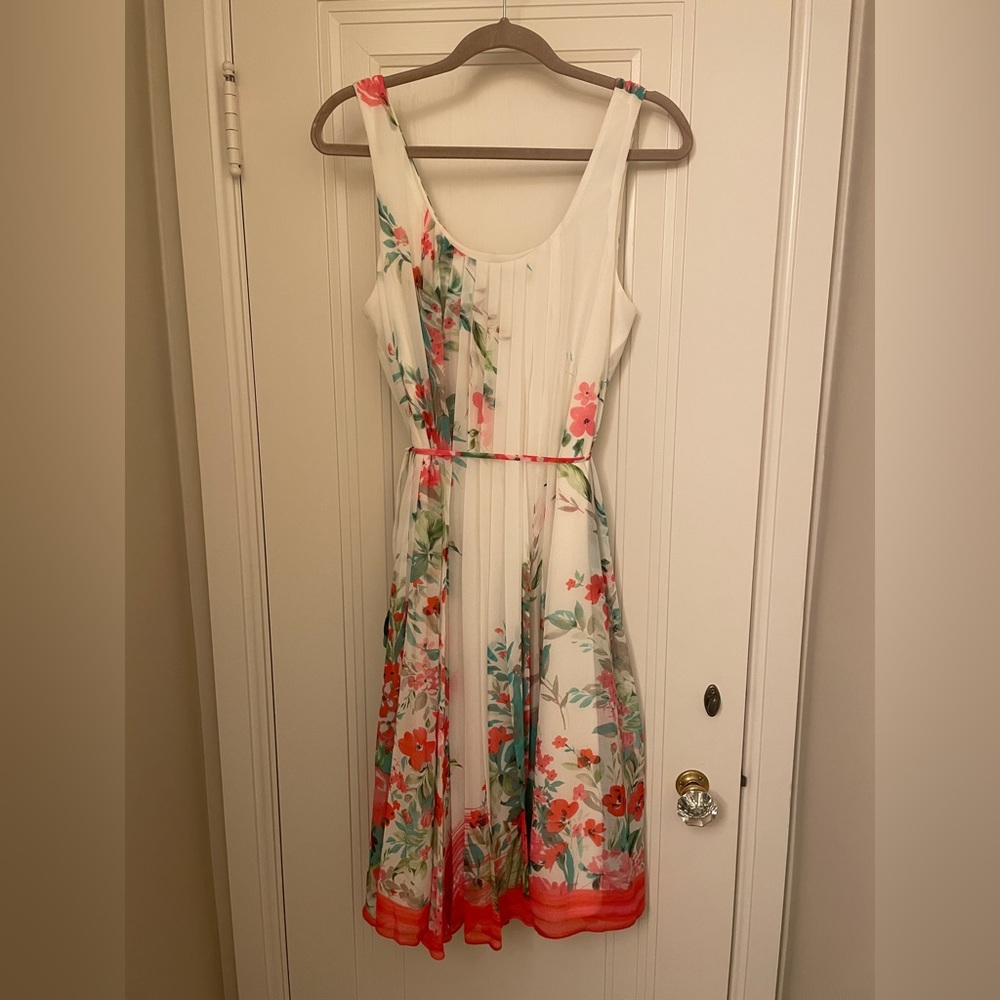 New without tags! Floral sleeveless mid length dress